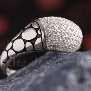 A silver ring with cubic zirconia accent stones that is suitable for both men and women. Handcrafted in exquisite silver