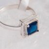 A stunning blue sterling silver ring