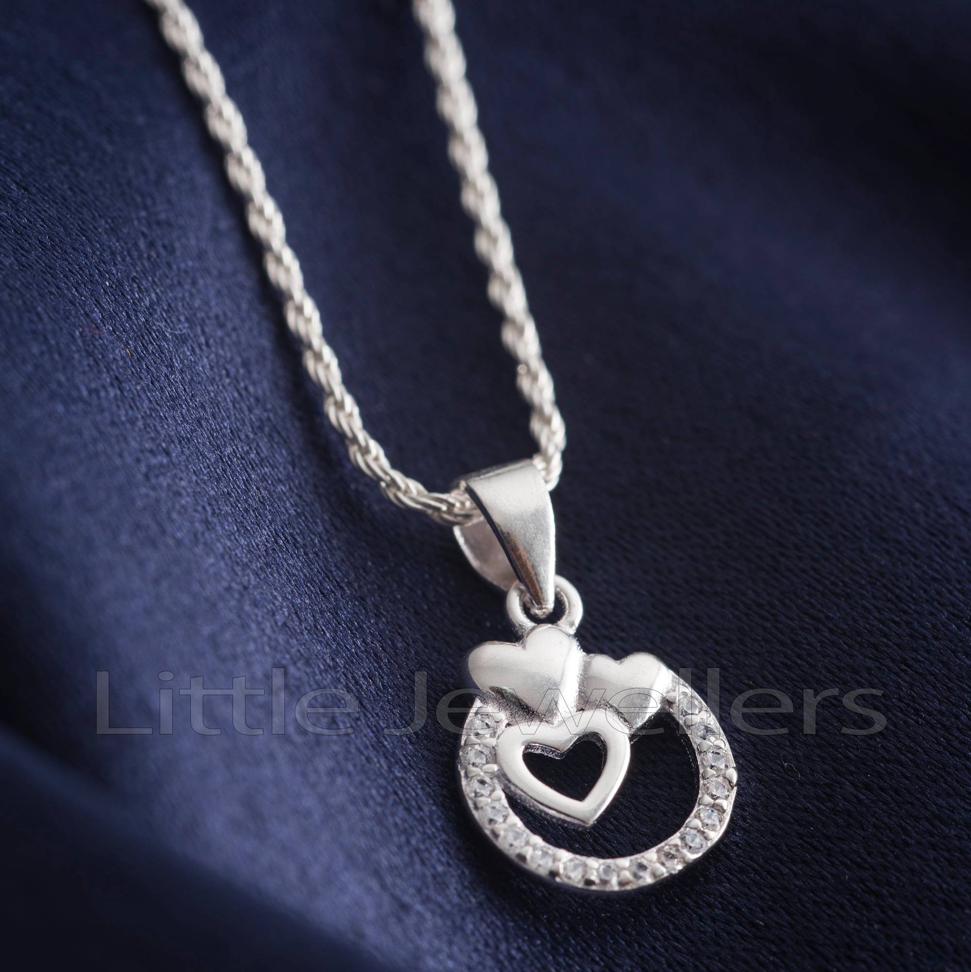 three heart designed pendant