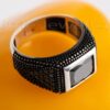 Draw attention with this classic rectangular shaped onyx black male ring