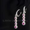 These stunning cz ruby earrings combine style and fashion. Never has jewelry felt so wonderful