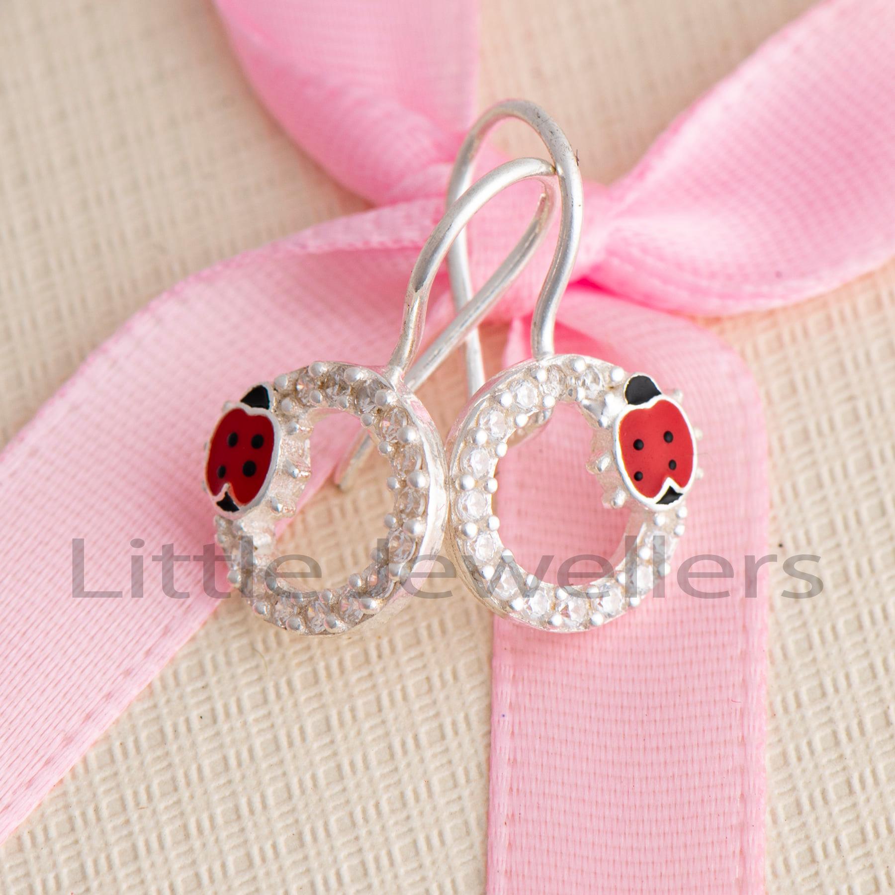  A charming pair of red ladybug earrings for children