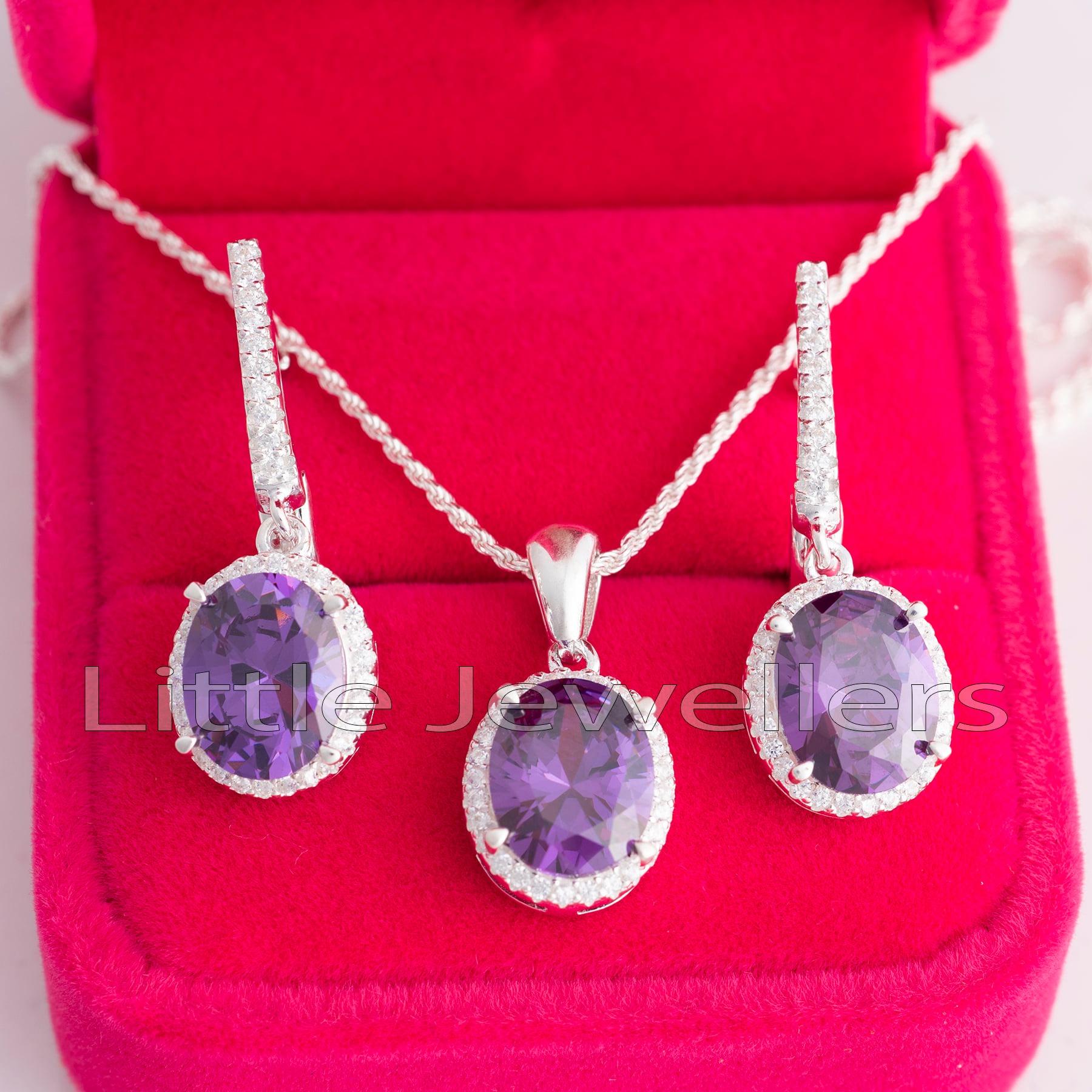 The sterling silver oval-shaped hanging amethyst necklace set is a timeless piece of jewelry that would make an ideal gift for yourself or someone you care about