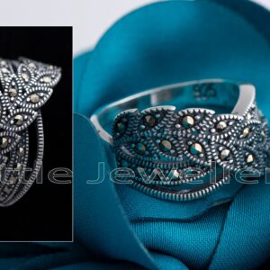 A spectacular marcasite ring with a vine leaf wrap design that will accentuate your creative flair.