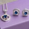 Look dazzling in this unique sterling silver necklace set with blue sapphire stones. Perfect for fashion jewelry fans