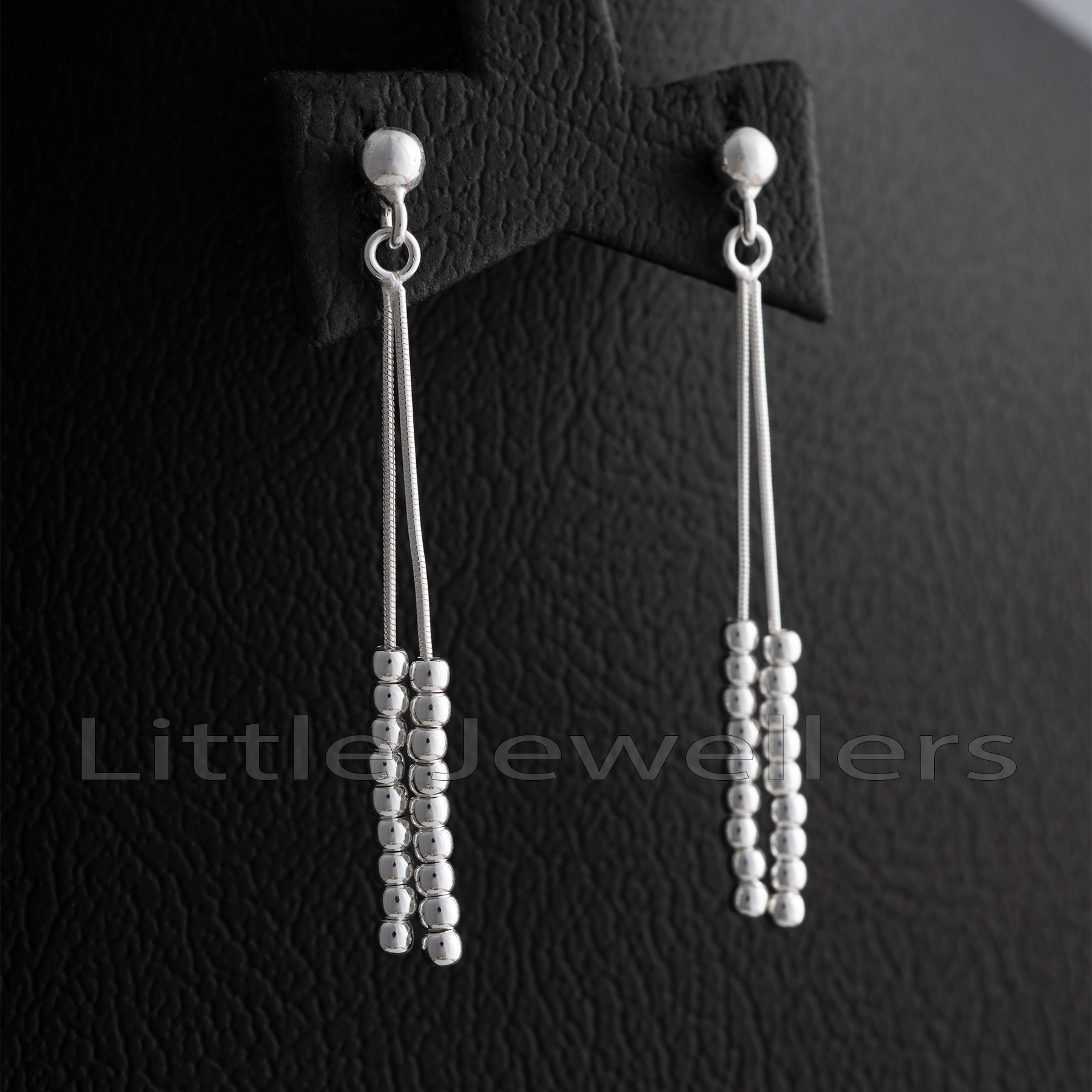 These stunning silver strand earrings are perfect for you