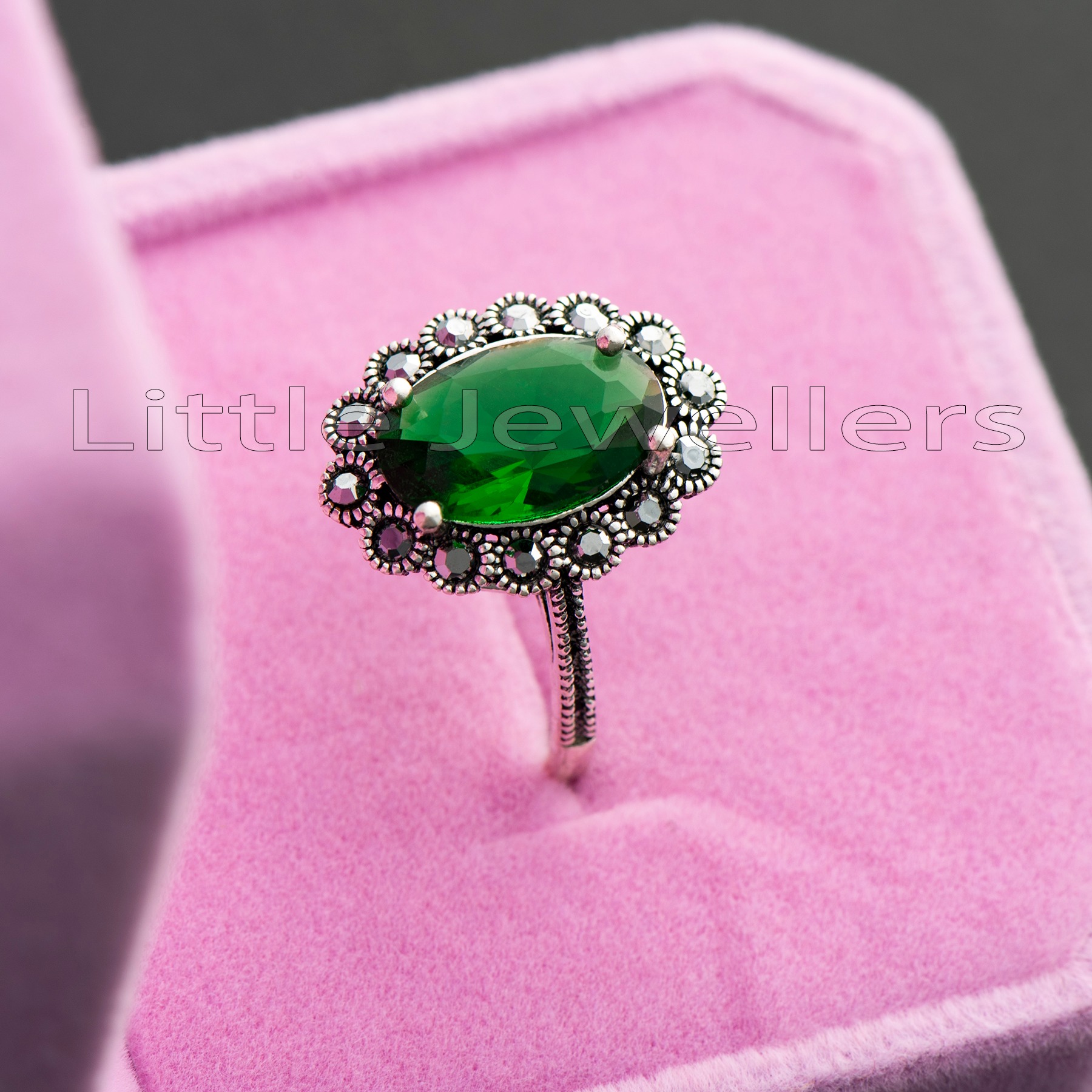 Do you want an accessory that can work with any outfit? Take a look at this silver green ring