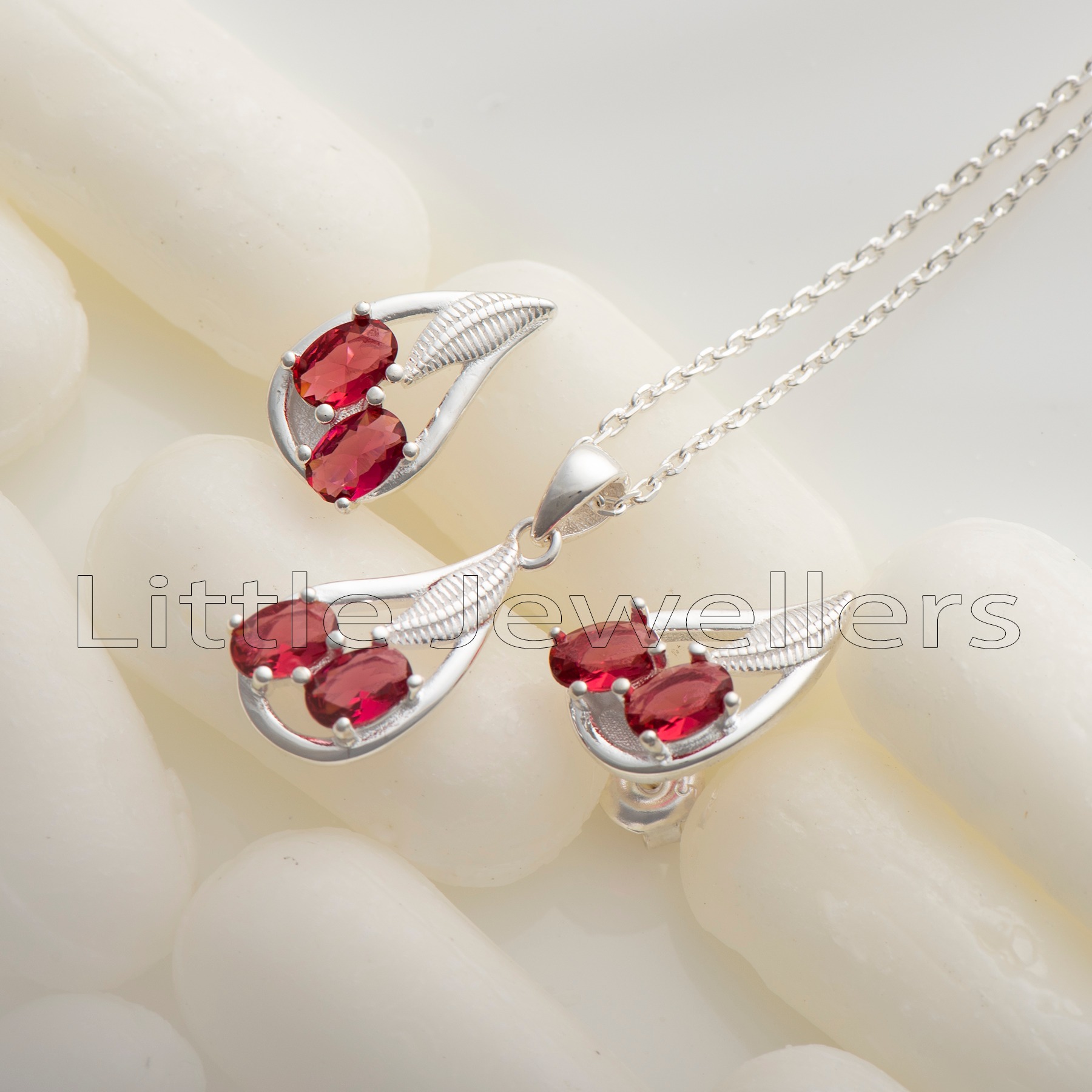 This silver necklace has a beautiful red design inspired by the wonders of nature. It's also hypoallergenic and comfortable to wear