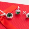 Add a touch of sparkle to your wardrobe with this timeless green necklace set. Crafted from sterling silver and zirconia stones