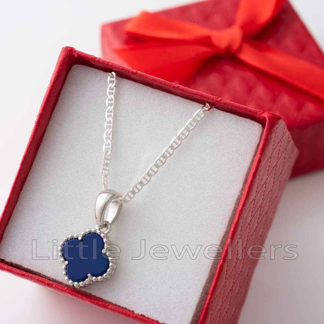 Make a statement with this stunning sterling silver adjustable chain featuring a blue four leaf clover pendant necklace