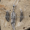 Finely detailed elegant leaf pendant with matching earrings