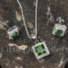 Light up your look with this silver cz emerald necklace set