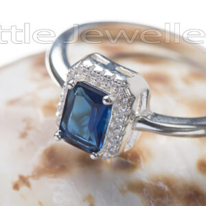 A magical silver blue ring deserves to sparkle on some lucky lady's finger